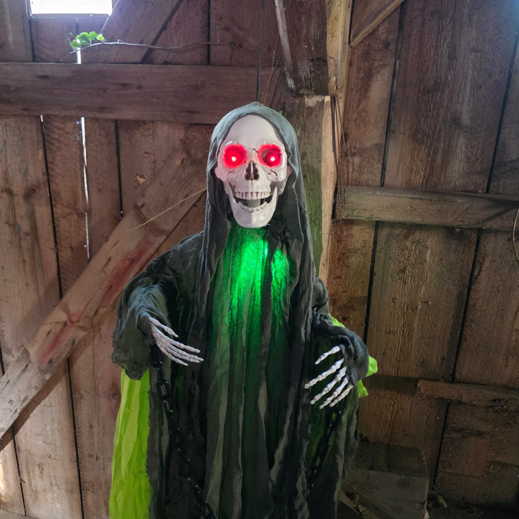 Toxicus – Animatronic Skelett mit neongrünem Gewand, 170 cm