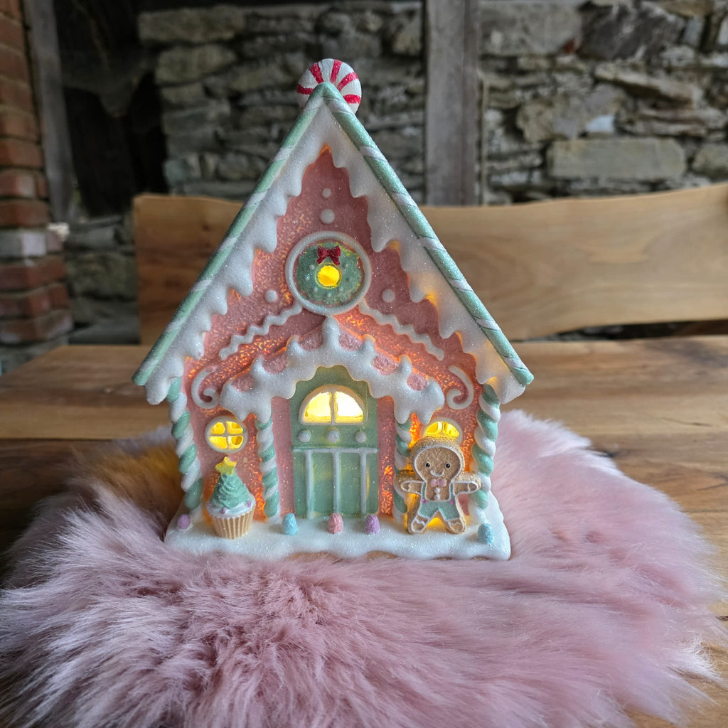 LED Weihnachtshaus – Funkelnder Weihnachtszauber in Rosa